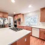 Seattle kitchen remodeling with modern island and wood cabinets