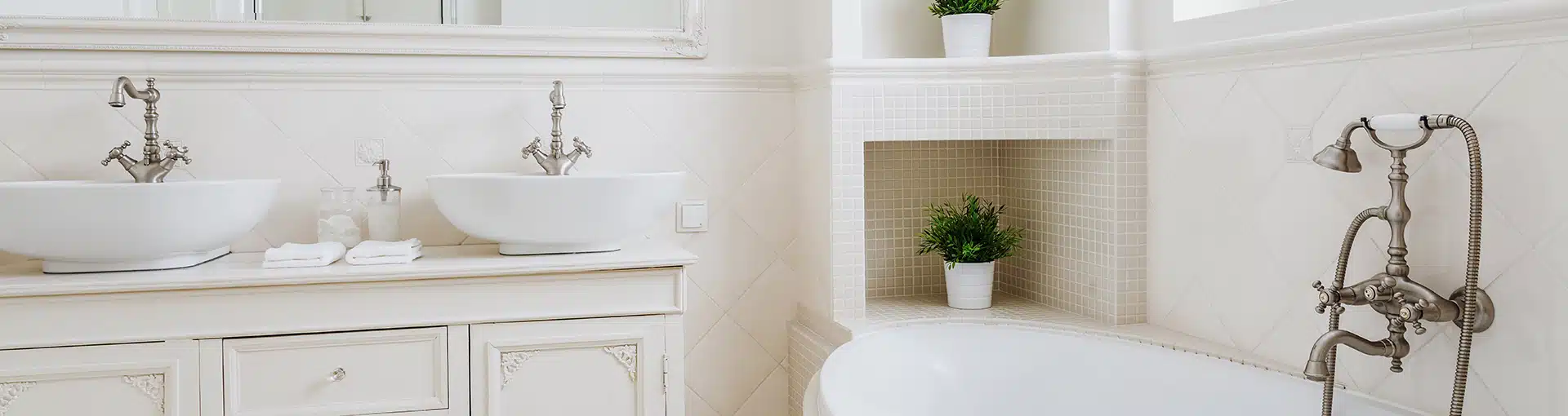 Professional bathroom remodeling with modern vanity and freestanding tub